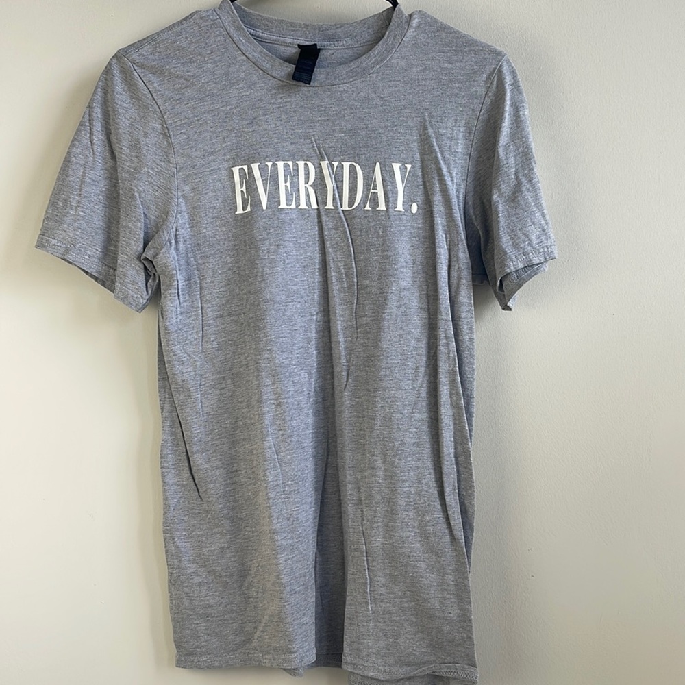 “Thank God Daily” streetwear casual style settings. Grey shirt white writing